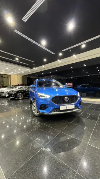MG